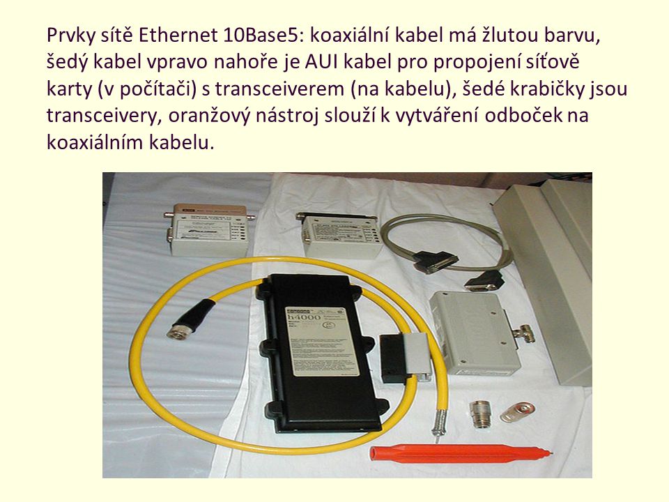 Prvky sítě Ethernet 10Base5: koaxiální kabel má žlutou barvu, šedý kabel vpravo nahoře je AUI kabel pro propojení síťově karty (v počítači) s transceiverem (na kabelu), šedé krabičky jsou transceivery, oranžový nástroj slouží k vytváření odboček na koaxiálním kabelu.